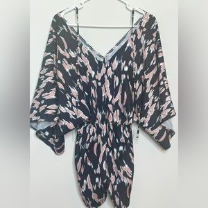 Romper (BRAND NEW) size medium